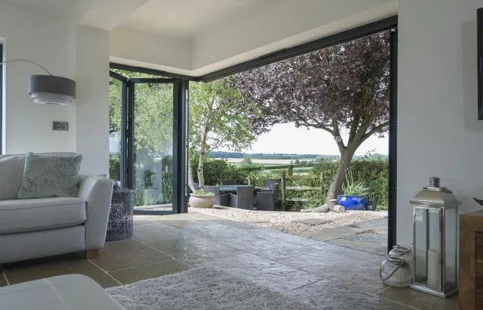 Open corner sliding door in a living room