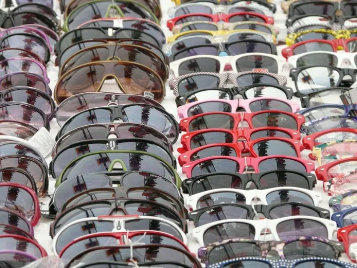 Sunglasses laid out in rows