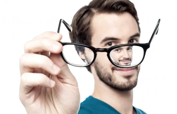 Man with glasses on white background