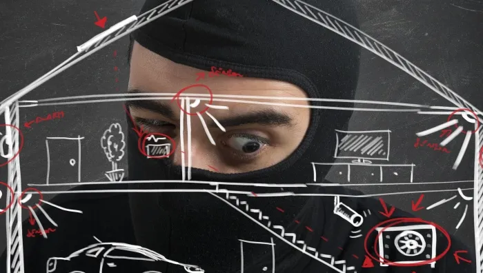 Burglar studies house alarm sketch