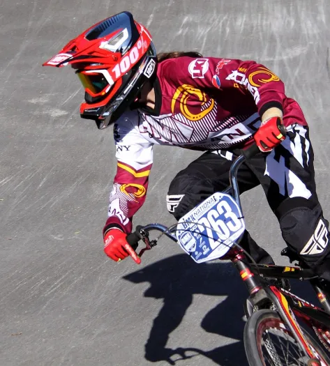 BMX rider in red outfit