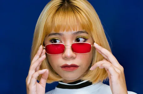 Woman in red retro glasses