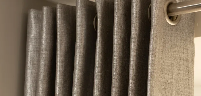 Eyelet curtains in grey