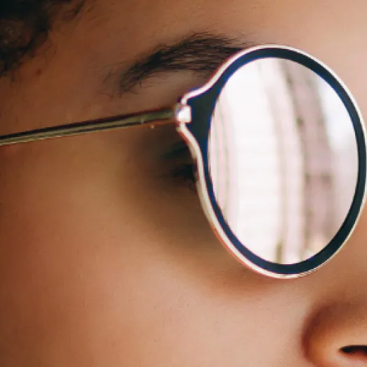 Woman with black and white retro sunglasses