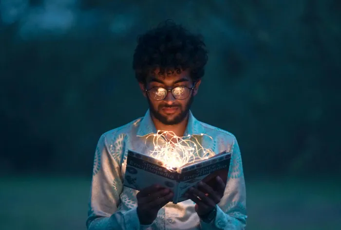 Man Holding Book