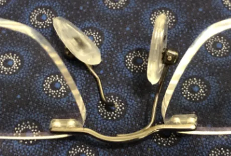 Broken nose pad on glasses