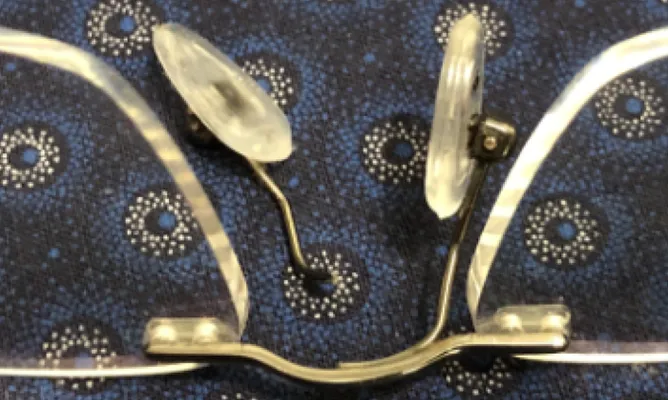 Broken nose pad on glasses