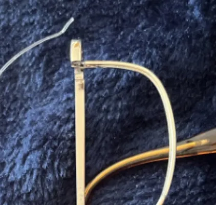 Broken metal eyewear frame