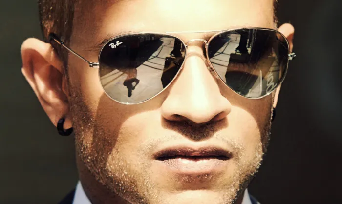 Man wearing Ray-Ban sunglasses