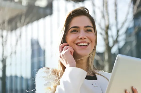 Woman In White Blazer Holding Tablet Computer