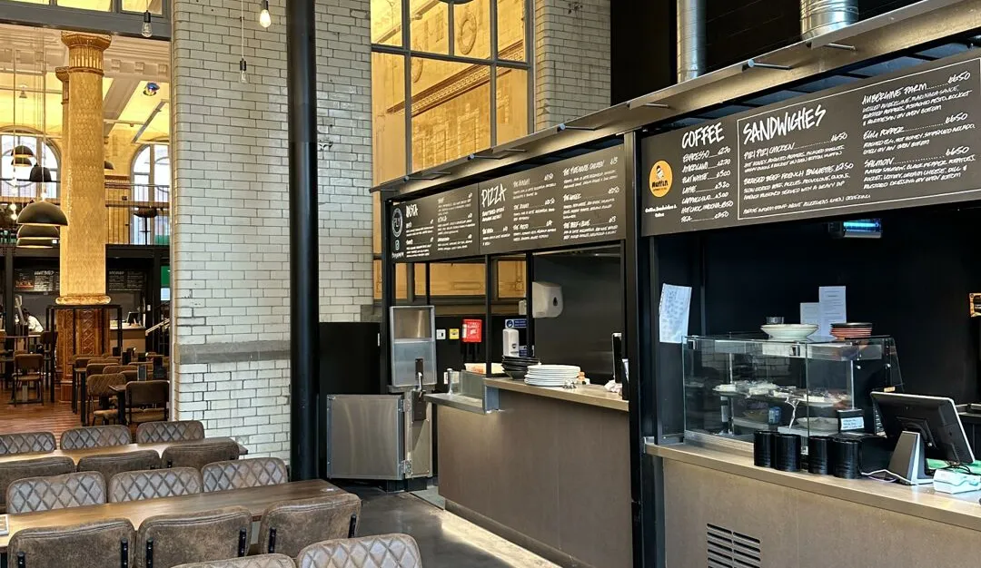 Large modern open-plan restaurant with indistrial themed fit-out