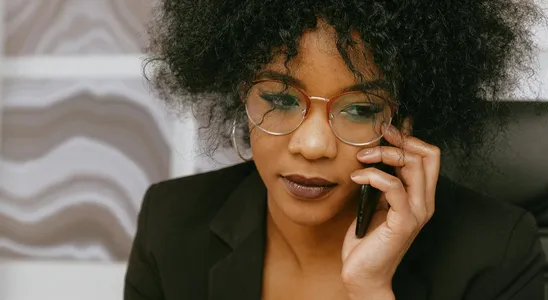 African American businesswoman in office, focused