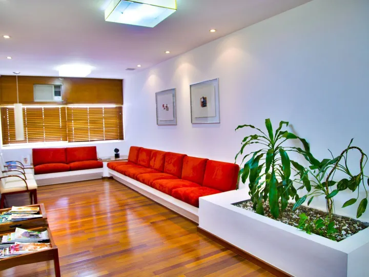 Doctor's waiting room with red chairs
