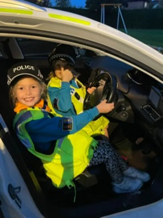 Beavers in police car Oct 2023 Photo 2023 10 09 20 28 49