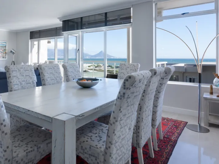 Large windows in a kitchen dining room