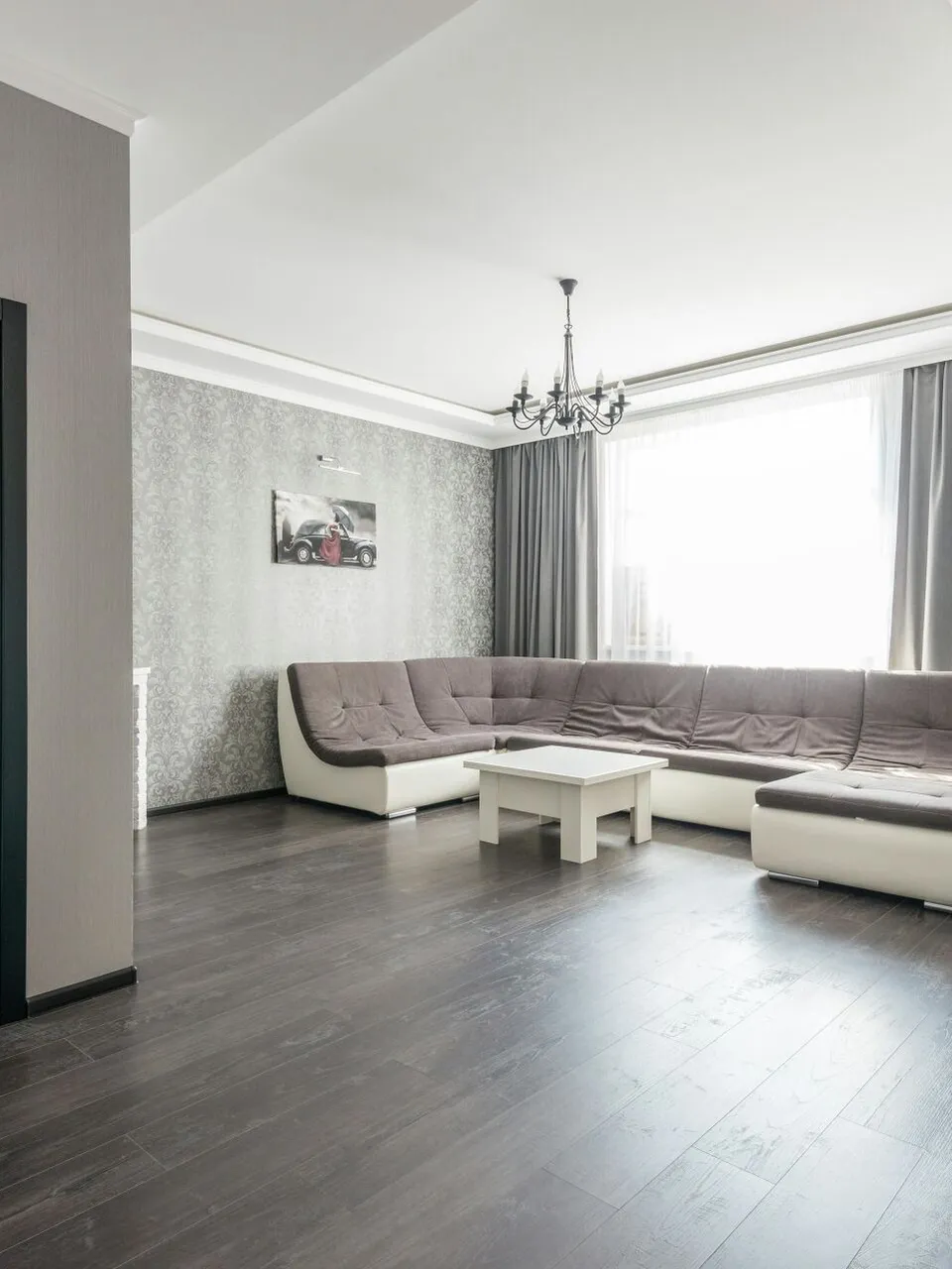 View of empty spacious living room with wooden