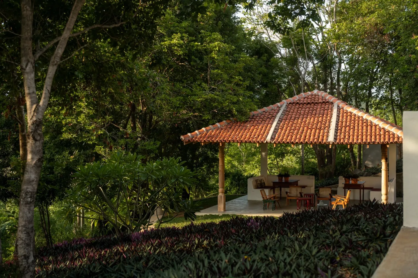 The tiled ambalama pavilion in the garden at Peacock Hill Sigiriya