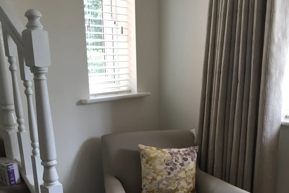 Venetian blinds in hallway