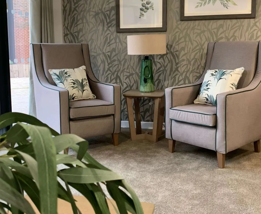 Gorton Mill with grey chairs and plant