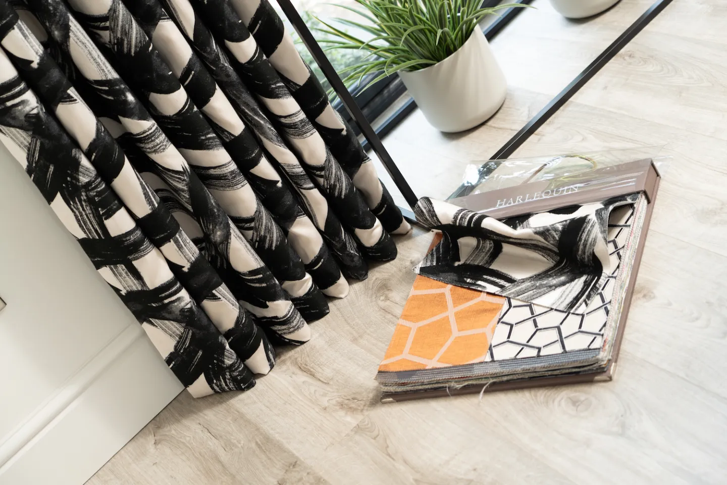 Black and white curtains with fabric book