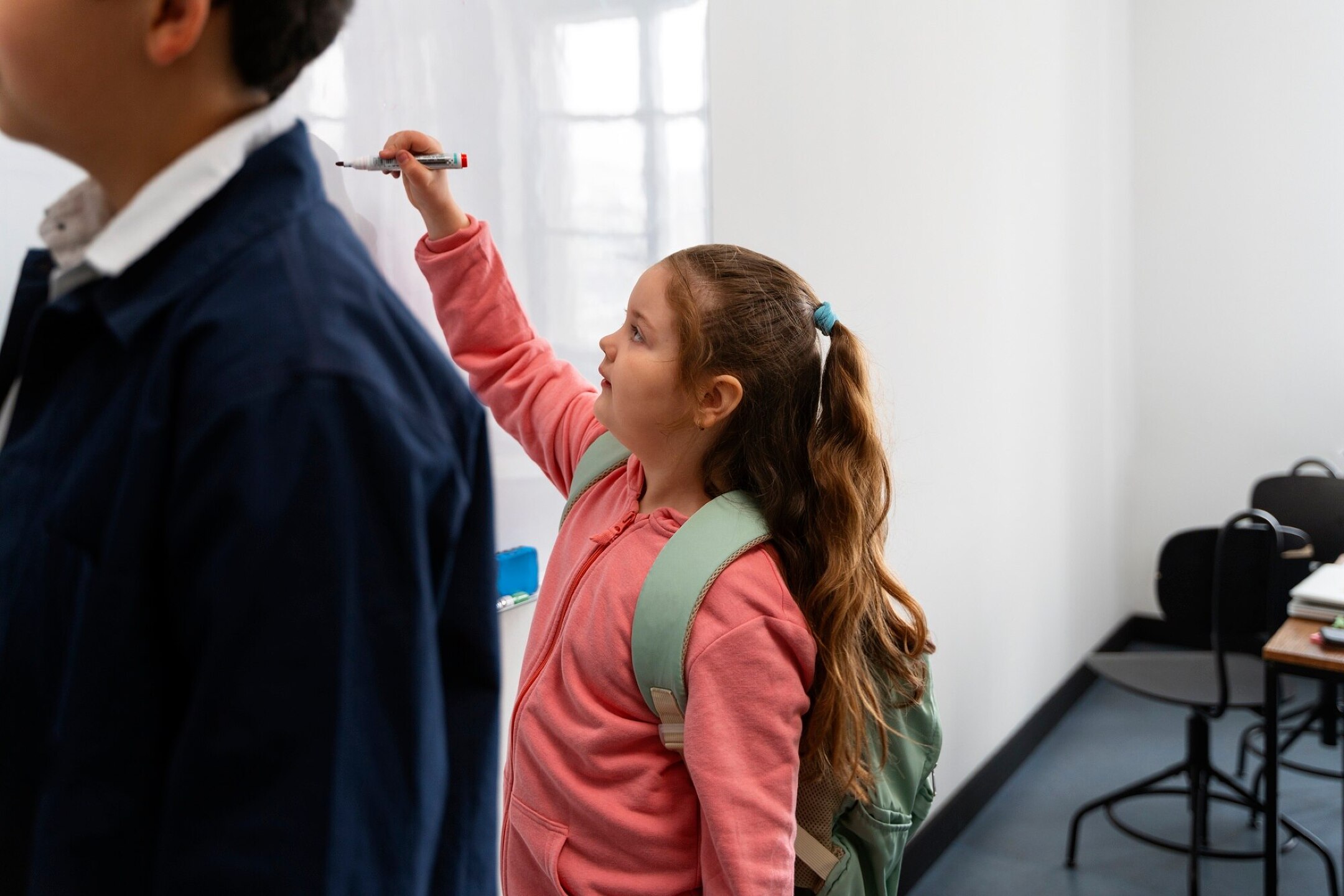 Side view girl studying at school