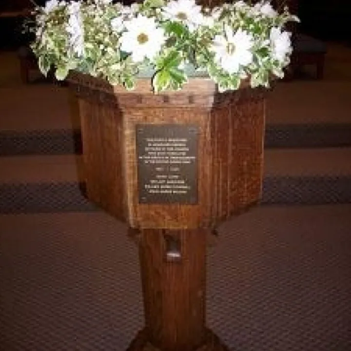 Baptismal Font With Flower Arrangement
