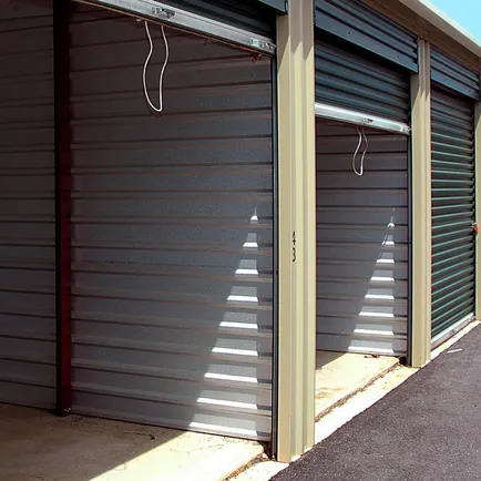 Cladding on a row of storage units