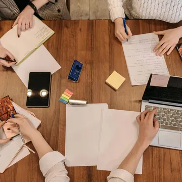 Top view of a team planning and working together