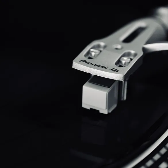 Turntable needle on vinyl, monochrome