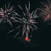 Vibrant fireworks illuminating the night sky with