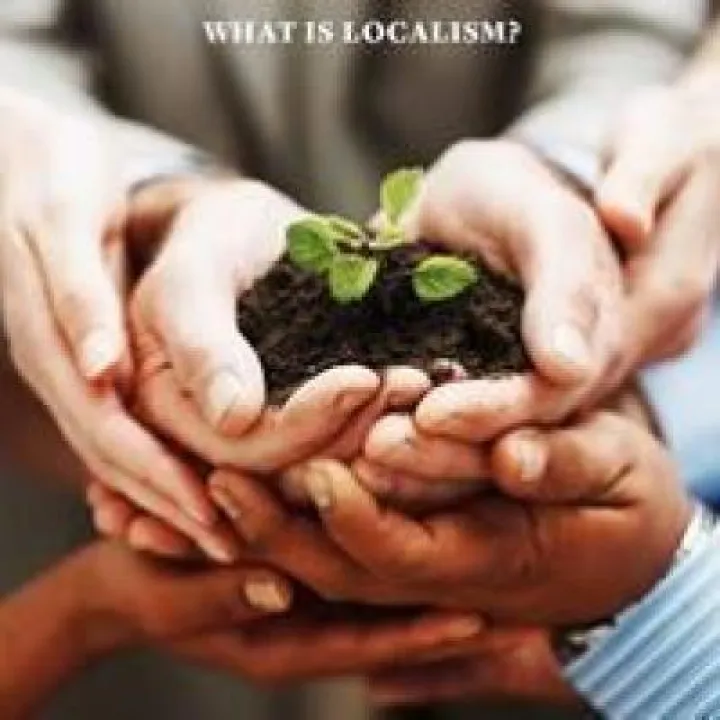 Cover of What is Localism?, showing hands holding a seedling in soil