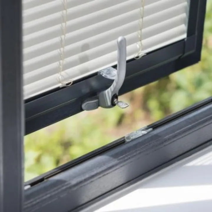 Tilt and turn window in dark grey