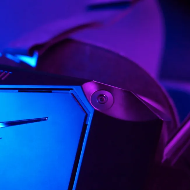 Front view of the Pimax Crystal Light 3 VR headset with blue and magneta lighting