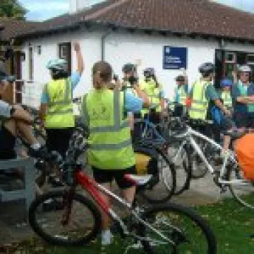 Members of the Bike Club prepare for a ride