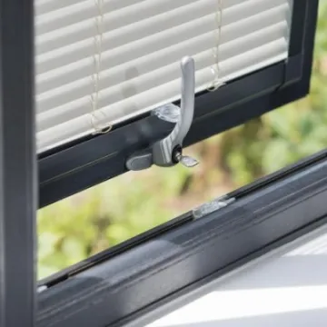 Tilt and turn window in dark grey