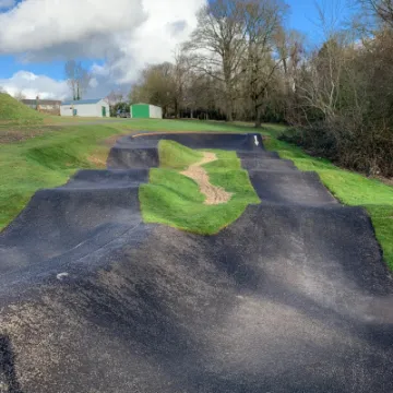 Battle pump track rollers
