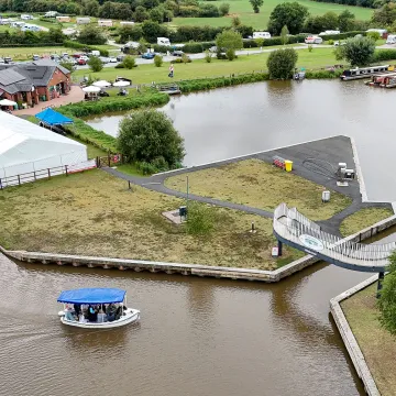 Audlem Lass approaches Overwater Marina and Cafe at Bridge 80