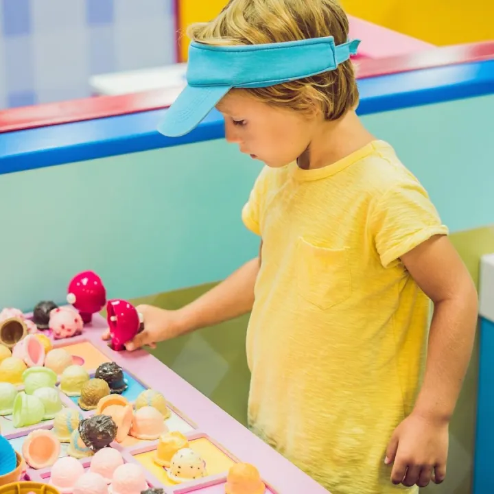 Children play as ice cream seller.