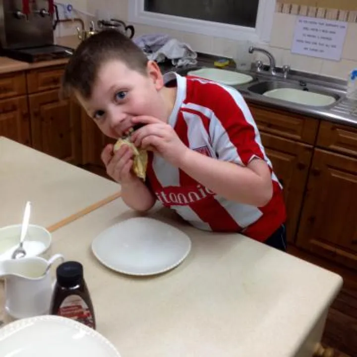 Arthur eating pancakes