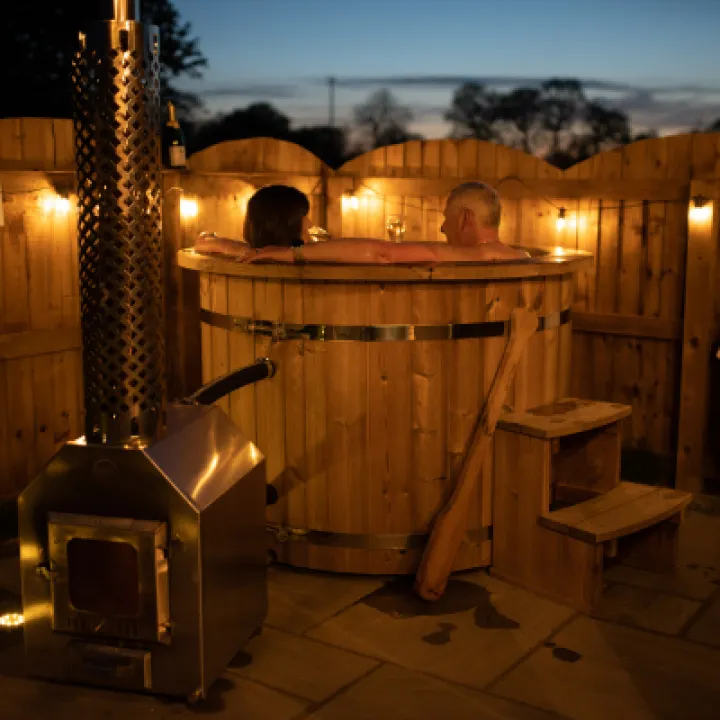 Overwater Luxury Glamping Hodnet Hot Tub at Night 4
