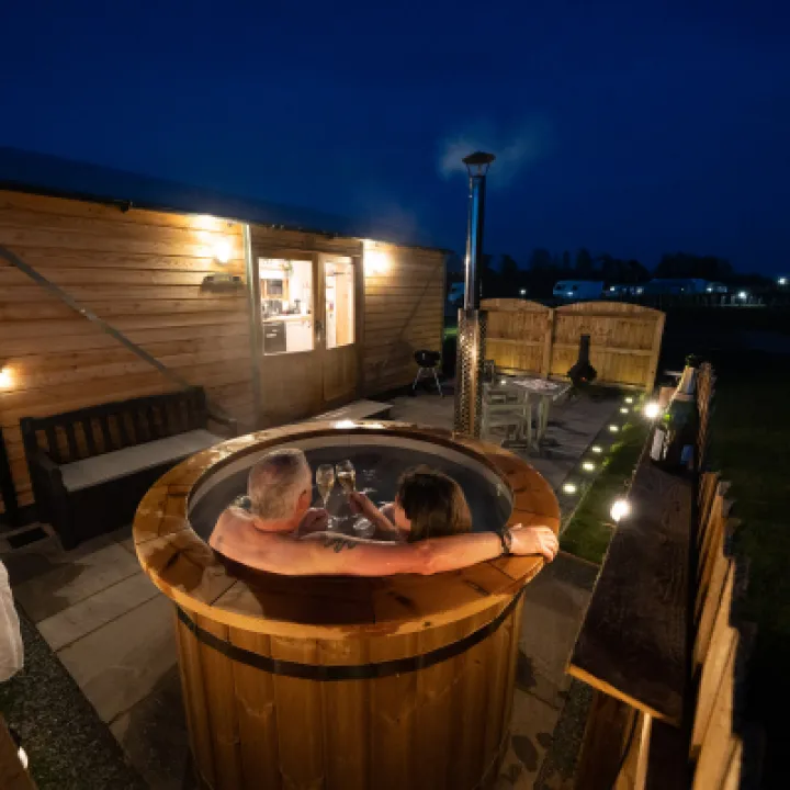 Overwater Luxury Glamping Hodnet Hot Tub at Night 6