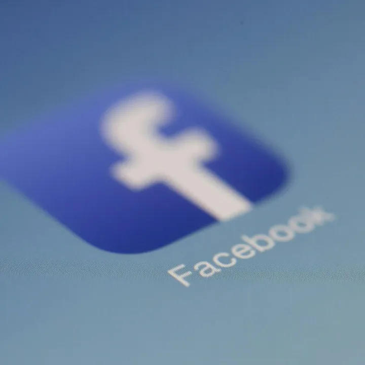 Close-up view of the Facebook app logo on a