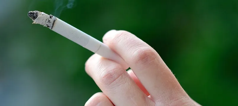 "Hand of smoking person"