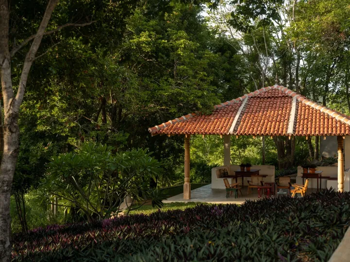 The tiled ambalama pavilion in the garden at Peacock Hill Sigiriya