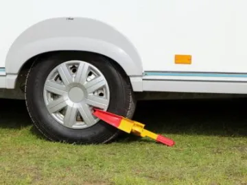 Caravan with wheel clamp