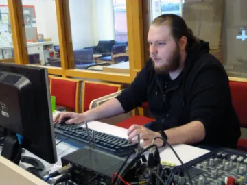 Trinity Rob at the sound desk