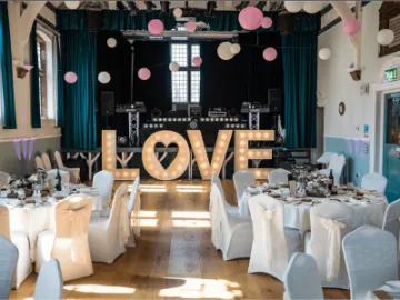 Wedding venue, circular tables, love