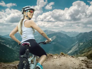 Woman cyclist with sunglasses