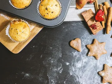 A delicious arrangement of muffins and cookies wit