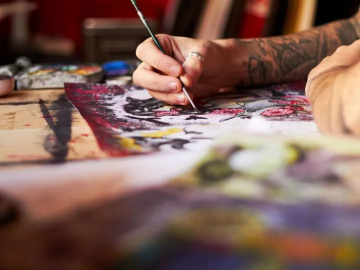 The key is in the detail A closeup of a tattoo artist using 